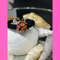 Handmade armband met oranje bruine lampworkkraal