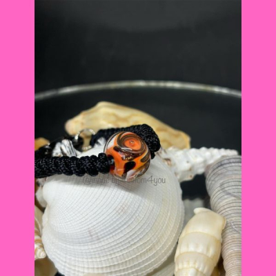 Handmade armband met oranje bruine lampworkkraal